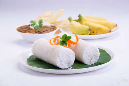 Puttu,steam cake ,white raw rice puttu , pacharisi maavu puttu with kadala curry and banana...