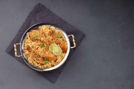 Dum chicken biriyani, close up image of Kerala-Thalassery biriyani  which is mixed with masala and...