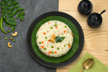 Upma made of samolina or rava upma, most famous south indian breakfast item which is arranged in a ...