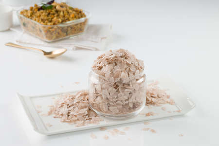 Raw poha or Aval placed with Aval upma or poha  upma or kanda poha upma,healthy indian breakfast...