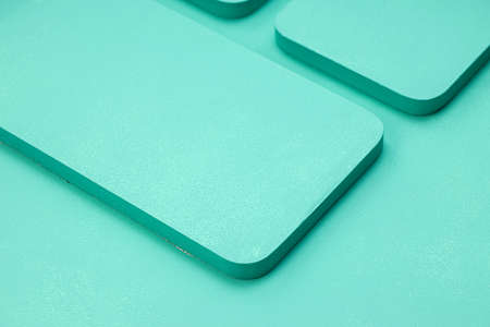 Aqua colour, solid colour background with same colour rectangle base placed over it.