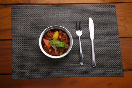 Indian dish_Veg Kolhapuri, north indian dish arranged in a steel bowl which is made using mixed vegetables,spicy dish a good combination for chappati and rotiの写真素材