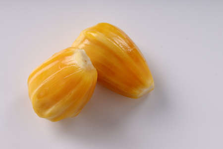 Ripe Jackfruit arranged beautifully in a  white textured background, isolated.