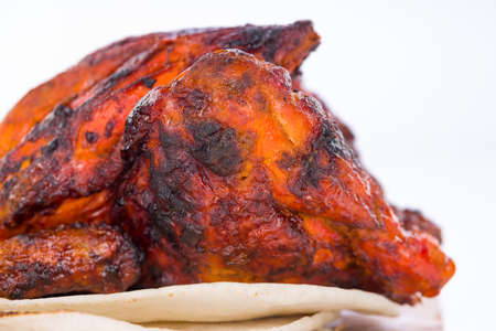 Shawai chicken arranged on a wooden base with kuboos ,closeup view.の写真素材