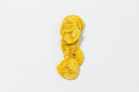 Kerala chips or Banana chips, cult snack item of Kerala,Isolated image with white backgroundの写真素材