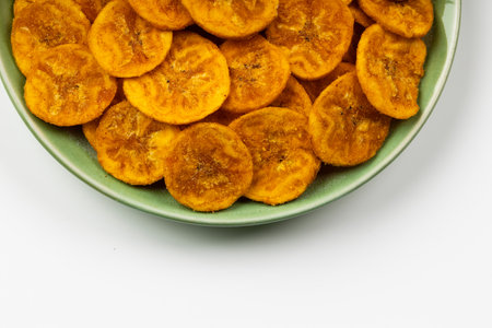 Kerala chips or Banana chips, cult snack item of Kerala,Isolated image with white backgroundの写真素材