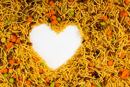 MIXTURE , commonly known as "Chivda" or "Namkeen," is a popular and delicious savory snack in India, a mixture of various crunchy and flavorful ingredients,の写真素材