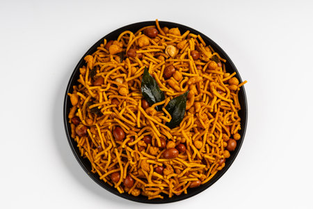 MIXTURE , commonly known as "Chivda" or "Namkeen," is a popular and delicious savory snack in India, a mixture of various crunchy and flavorful ingredients,の写真素材