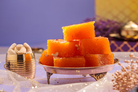 Indian-Kerala sweet dish-Halwa or Halva ,arranged in a festive background.
