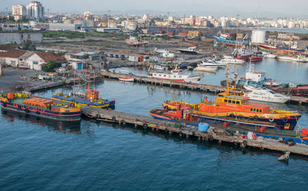 Durres, Albania - June 2019: Small boats docked at Durres Port.のeditorial素材