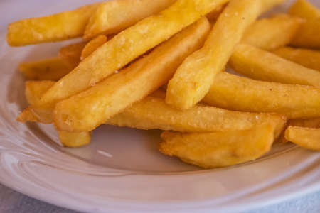 French fries on a plate.
