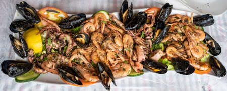 Fried mixed seafood dish served at a restaurant in Saranda, Albania.の写真素材