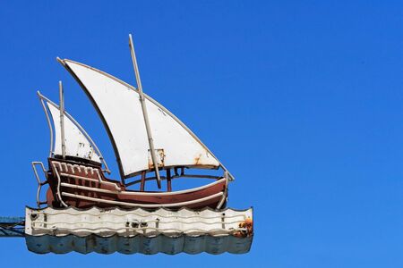 Street neon in the shape of a yacht. Picture taken in Lisbon / Portugal.の写真素材