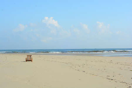 A lonely chair by the beachの写真素材