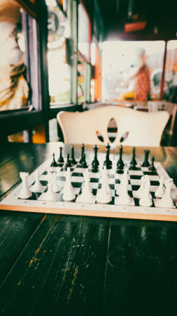 Chess game on wooden table - Vintage filter effect processing style picturesの写真素材