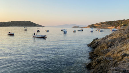 Fishing boats on the Aegean sea at sunset, FoÃ§a, Izmir, Turkeyの写真素材