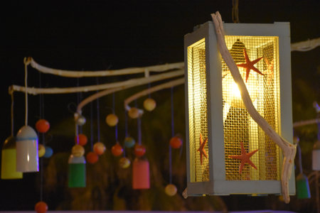 decorative sailor lamp hanging from the ceiling in  Aegean island restaurant roof