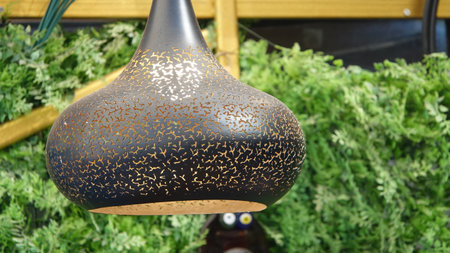 Decorative lamp in the form of a vase with a pattern