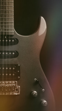 Electric guitar with shallow depth of field and blurred background, close up