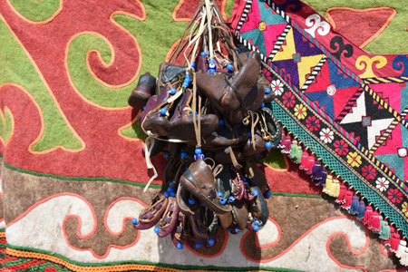 Traditional souvenir leather small shoes on street market in Istanbul EminÃ¶nÃ¼. Turkish traditional boot. turkish traditional carpet design, motif.の写真素材