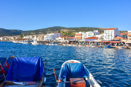 FoÃ§a, Ä°zmir, Turkey 29 Jun 2021 Fishing boats with Turkish flags along the coastline of...