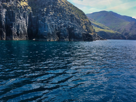 The volcanic rock formations along the sea strip on Imbros island of GÃ¶kÃ§eada are called Cheese cliffs. Canakkale, Turkey.の写真素材
