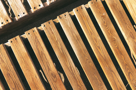 Wooden pergola on the beach, closeup of photo. vintage and brown wooden fence background or beach...