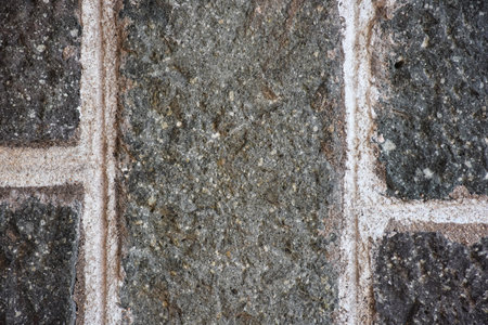 Background of stone wall texture. Close-up, selective focus.