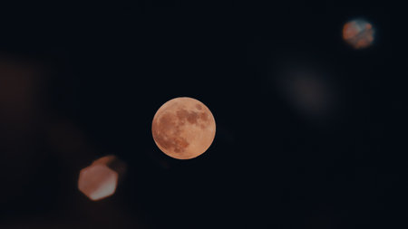 Full moon in the night sky. Close-up. Selective focus.の写真素材