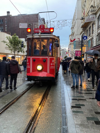 Istanbul, Turkey Jan 12, 2023: A view of Nostalgic Red Tram in Taksim Istiklal Street. Taksim Istiklal Street is a popular destination in Istanbul. Beyoglu, Taksim. Turkey.のeditorial素材