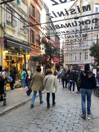 Istanbul, Turkey March 20,2023 People walking in Istiklal street. Istiklal Street is a popular tourist destination in Taksim district of Istanbul.のeditorial素材