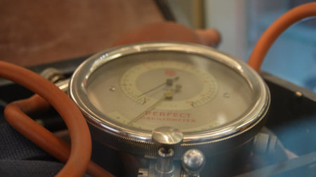 Blood pressure meter and stethoscope, closeup of photo.