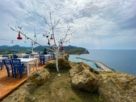 Gokceada,Canakkale,Turkey May 28, 2023:Fish restaurant in Kalekoy Village, Gokceada. Gokceada which is the largest island of Turkey is a rural district of Turkeyのeditorial素材