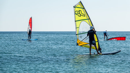 Gokceada, Canakkale Turkey July 29, 2023; Wind surfers enjoying the Aegean sea and the wind in...