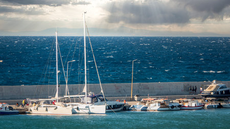 Gokceada, Canakkale, Turkey August 18,2023: Fishing and touristic excursion boats anchored in...