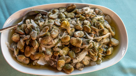 Traditional Turkish food; Fresh broad bean salad with olive oil, broad beans, onion and dill (Turkish name; Ä°Ã§ bakla) Mediterranean style fava beans.の写真素材
