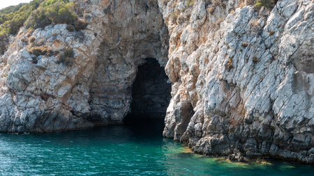 The sea cave located in Demircili bay between the Urla-Seferihisar coast of Izmir, Turkeyの写真素材