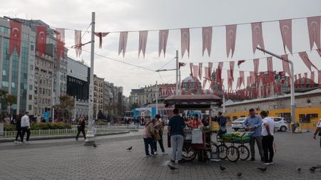 Taksim, Istanbul, Turkey - September 15, 2023: Tourists and locals enjoy city life in Istiklal street, the most famous city street.のeditorial素材