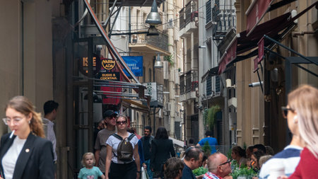 Taksim, Istanbul, Turkey - September 15, 2023: Tourists and locals enjoy city life in Istiklal street, the most famous city street.のeditorial素材