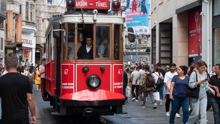 Istanbul-Turkey Sep.20, 2023: Tourists and local people traveling by historical red tramway. Taksim is one of the most popular tourist destinations in Istanbulのeditorial素材