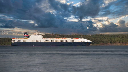 Canakkale, Turkey, Nov.12,2023: Cargo ship passing through the Canakkale Strait. Canakkale Strait is one of Turkey's busiest sea crossing points for cargo transportation.のeditorial素材