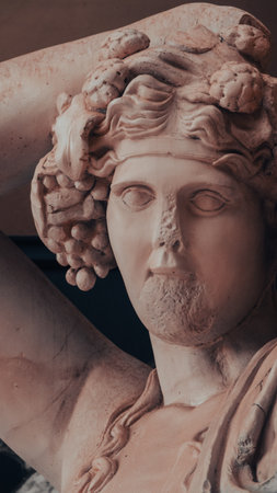 Canakkale, Turkey - Nov 19, 2023 Close up face of Dionysus statue. God of wine and revelry Greek mythology. Sculpture Roman mythology; Bacchus.のeditorial素材