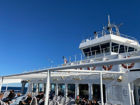 Gokceada, Turkey, Nov 16, 2023 'GestaÅŸ' ferry boat loaded with cars and passengers crosses the...