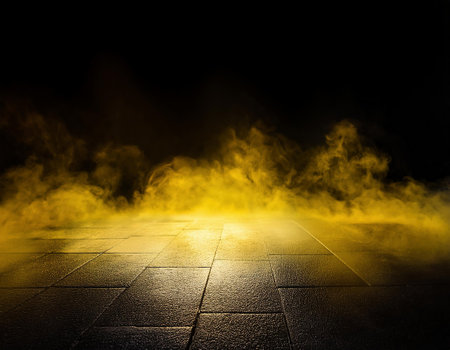 Grunge brick floor with yellow smoke on dark background. Abstract backgroundの素材