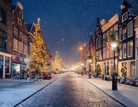 Amsterdam street in winter with christmas tree and lights, Netherlandsの素材