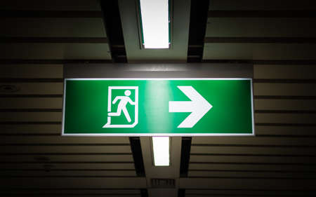 Emergency exit sign at metro station.の写真素材