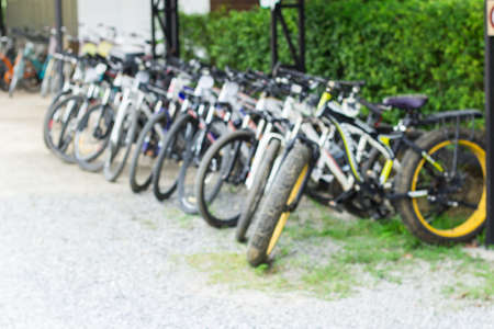 Group of bicycles in the row at bicycle parking. Blurred image.の写真素材