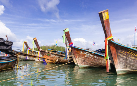 KRABI, THAILAND - June 26, 2018: Longtail boats in bay at Noppharat Thara beach - Phi Phi islandのeditorial素材