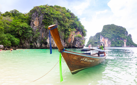 KRABI, THAILAND - June 26, 2018: Longtail boats on the beach at Paradise islandのeditorial素材