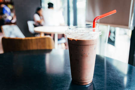 Cup of Iced chocolate on table in the cafeの写真素材